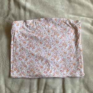 Reversible floral/white tube top.